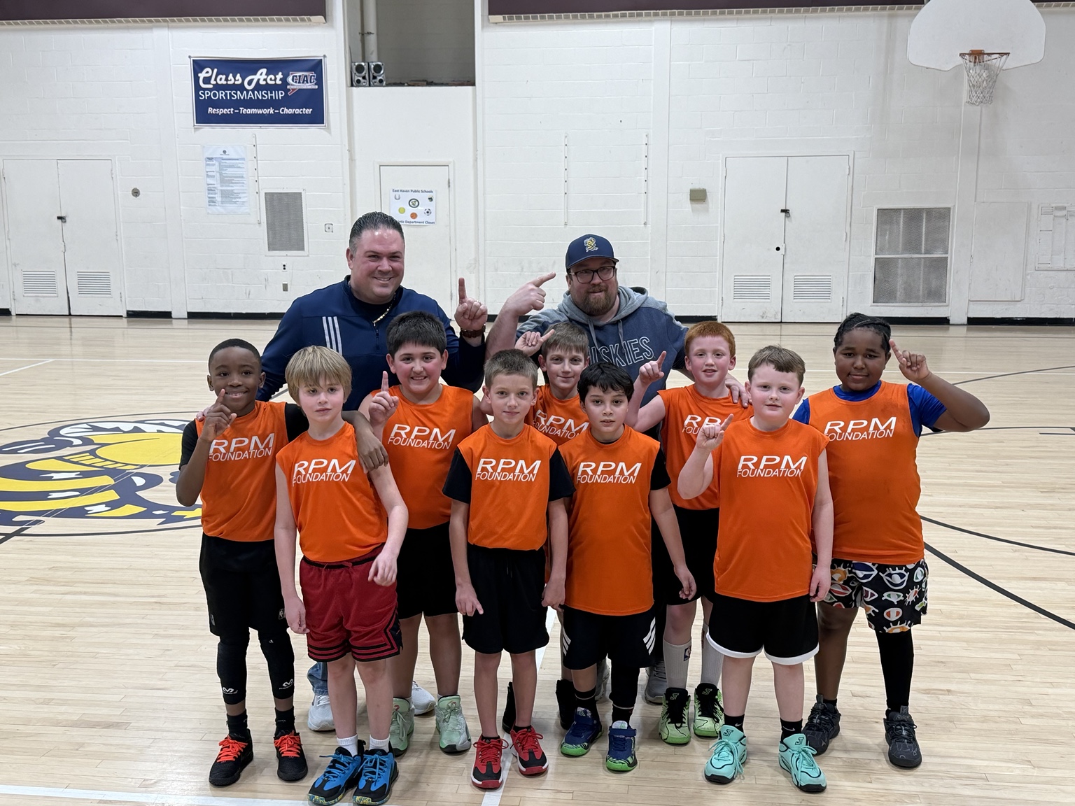 Sal Tinari Biddy Basketball championship team wearing RPM Foundation jerseys